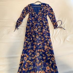 Blue floral romper with long sheer overlay